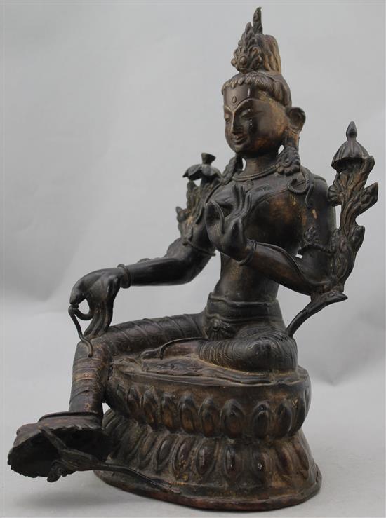 A Sino-Tibetan bronze seated figure of Green Tara, 30cm